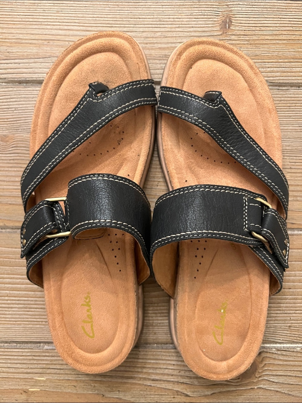 Clarks Black Leather Dual-Strap Slide Sandals with Tan Footbed